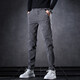 Pantalones casuales para los pantalones deportivos heterosexuales de primavera y verano de verano 2025 tendencia elástica de estilo de primavera y otoño 653 negro 28