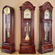 Horloge de scénario salon en bois massif en bois de mécanique européen horloge de temps classique chinois luxe atmosphérique cuivre horloge verticale 9922 Couleur en acajou allemand huit tonnes de huit tonnes de 14 pouces