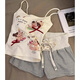 Schauen Sie sich auch niedlichen Welpendruck mit Brustpolster kleiner Hosenträger Pyjamas für Frauen im Sommer im Sommer Heiße Mädchen Weste Striped Shorts Home Clothing Set S2506 süßer Welpe festes Brustpolster M.