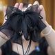 Princess Xiang's bow tie streamer ponytail clip for women's back half-tied hair clip style shark clip Hepburn hair clip headdress black mesh bow clip