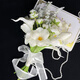 Wedding flowers holding flowers in hand, bride holding wedding pictures with tulips and gets a marriage certificate and simulated flowers taking photos of Chinese Valentine's Day. Pink and white flowers holding flowers