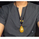 Fat Donglai buys the same style of water drop beeswax amber pendant original stone for old men and women chicken oil yellow safe buckle beeswax water drop necklace