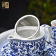 Close-up blue and white porcelain tea set Jingdezhen ceramic complete set household double-layer anti-scald tea cup living room office tea tray Panzhilian