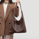 Qianbaidu Cbanner Cowhide Bag Сумка для женской сумки с большой емкостью одно плечо.