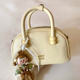Nanfeng Chio2nd Pillow Bag Damen 2025 Super heiße Handtasche kleine Handtasche One-Shoulder Crossbody Bag 520 an meine Freundin Gänsegelbe Fotos von Geben auf meinen Puppenstift