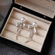 Bai Qixin 925 silver needle bow imitation pearl earrings for women light luxury niche high-end temperament earrings 2025 new earrings bow pearl tassel earrings