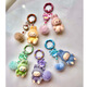 Mini Labubu Labuba Keychain Enamelo Recubierto lindo Bolsas para caminar de grano colgante de teléfono móvil lindo adorno colgante Labuba Color rosa