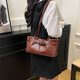Spring and summer retro versatile new shoulder bag fashionable work commuting fashion bag casual versatile niche shoulder red brown