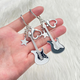 American Hot Girl Style Y2K E -Gitarrenstar Schlüsselbund in Retro Trockener jubilanter Bass Schlüsselbeutel Keychain Gitarre Keychain - Weiß