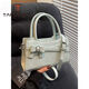 Tangku exquisite niche bowling bow new fashionable versatile shell high-quality handheld crossbody bag high-value pink