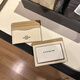 COACH Tongma Coach Unisex Small Card Holder Card Holder Simple and Space-Saving 1. Black and gray logo 10*7.5 cm