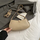 El popular bolso de este año para mujeres nuevos de 2025 nicho de moda súper caliente de un solo hombro bolso de axilas que viajan a través de una bolsa cuadrada pequeña color caqui color