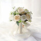
Zhenxi bride gets a marriage certificate and holds flowers and takes photos and props. Simulated flowers and bouquets of weddings. White roses. Three lives and three lives. [Champagne + white]