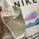 耐克（NIKE）短袖男装2025夏季新款跑步运动服针织透气时尚宽松圆领上衣T恤衫 HF6172-133米白纯棉 S