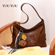 toutou2025 new spring silver puppy tote bag large capacity commuting crossbody bag fashionable armpit bag women mountain spring silver [pendant version]