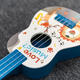ZuccaZucca Kindergitarrenspielzeug Ukulele Kleine Gitarreninstrument Musik frühkindliche Bildung Baby Geburtstag Geschenk 3 Jahre alte Kesmi -Giu - Geben Sie einen Gürtel -Tutorial Pick