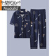 Modal 2025 Nuevo pijamas para hombres Traje de algodón de manga corta Pantalones de verano para hombres Los adolescentes pueden usar ropa casera fuera de G3884 Pantalones de manga de manga azul.
