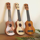 
Children's toys can play ukulele toys simulated guitar enlightenment puzzle musical instrument music toys [khaki] 21-inch ukulele-send music score