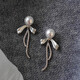 Bai Qixin 925 silver needle bow imitation pearl earrings for women light luxury niche high-end temperament earrings 2025 new earrings bow pearl tassel earrings