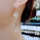 UOSU earrings for women, light luxury and high-end, cat's eye long earrings, versatile ins niche design ear wire, super fairy fashion jewelry, cat's eye tassel ear wire