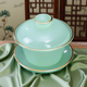 Xianjuren high-end sky blue Ru kiln gilt jade porcelain tea set light luxury gift mutton fat jade tea kung fu bowl gift box Ru Qing jade porcelain tea set gentian cup 12 pieces