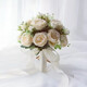 
Zhenxi bride gets a marriage certificate and holds flowers and takes photos and props. Simulated flowers and bouquets of weddings. White roses. Three lives and three lives. [Champagne + white]