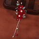 Butterfly Camellia roja Camellia Low Cheongsam Estilo antiguo con ropa tostada Cabezo chino Falda de la cara Accesorios para la altura de la novia Tres flores [1]