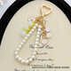Suntomoon Exquisites Glaslöckchen der Talblume einfache Mädchen Herz Perle Kette Schlüsselbund Custom Letters Student Best Freundes Bag Anhänger weißer Lilie des Tals - Türschnalle