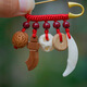 Jiuhuashan baby anti-fright pendant peach wood pin safety buckle pin baby dog tooth peach core