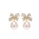 Qlady bow unique earrings earrings for women 2025 new temperament high-end light luxury earrings women's imitation pearl earrings