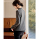 Shangjing's stylish and versatile half-turtle collar warm base layer embellished with gold buttons for fall and winter.