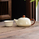 Creative tea set set household ceramic kung fu tea set teapot teacup modern Chinese style simple tea making tools bright yellow brown Xishi pot 1 pot 1 flat cup