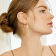 Qlady Mobius gold silver needle earrings women's plain hoop earrings 2025 new light luxury niche high-end earrings earrings