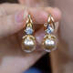 Copper alloy imitation pearl earrings, elegant purple pearl earrings, autumn and winter new style, light luxury, simple and exquisite earrings, 1 pair of classic white pearl earrings, light luxury quality