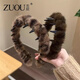 Zuoou 2025 new high skull headband with teeth, anti-slip, retro leopard print plush hairpin, high-end fashion headband and headwear, dark brown leopard print plush wave