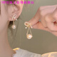 YRYE gold store model 999 sterling silver pure silver bow freshwater pearl earrings new French square round face trendy earrings bow pearl tassel earrings