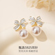 Qlady bow unique earrings earrings for women 2025 new temperament high-end light luxury earrings women's imitation pearl earrings