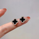 Exquisite and compact mini four-leaf clover earrings spring high-end 2025 new versatile earrings temperament commuter earrings black