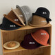 Woodpecker (TUCANO) side cm brown wool fisherman hat women's 2025 autumn and winter new hat retro dome hat curled top hat brown caramel adjustable