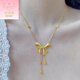 Giventi GEFIODEY new bag 18K fugitive princess necklace women's ribbon bow foot gold 999 pendant gold tassel collarbone ribbon bow necklace