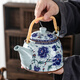Tang Yao retro large teapot handlebar set one pot two cups single pot household large ceramic teacup herbal teapot large capacity handlebar teapot - blue peony (one pot four cups)