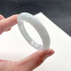 Le seul produit qui obtient ce que vous voulez est le bracelet rond de jade à 52 anneaux, largeur 10,5 mm, épaisseur 8,2 mm, poids 46,3 g, numéro de certificat numéro 1047