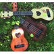 
Xian Huaida can play children's simulated guitar children's ukulele sends string-pull music scores for beginners toy musical instruments gift [44CM] Large size guitar-Acacia Mu