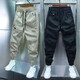 Pantalons décontractés de haute qualité de haute qualité pour garçons avec une salopette de taille polyvalente pour le printemps et l'automne Nouveau style pour les hommes pour les sports confortables et respirants 200 kaki [printemps et automne] xl