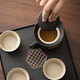 
BEYZK small tea plate, two people, Kung Fu small tea set, simple and modern home use SN3886, black pottery lifting beam, four cups, imitation black gold small square plate
