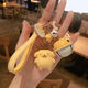 
Cartoon pudding dog keychain keychain internet celebrity girl cute creative gift personal doll car key pendant [little witch + bell] keychain