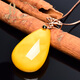 Ouchini natural unbaked beeswax pendant 18K gold inlaid with natural chicken fat yellow water drop amber necklace pendant for women (excluding chain) ready for delivery