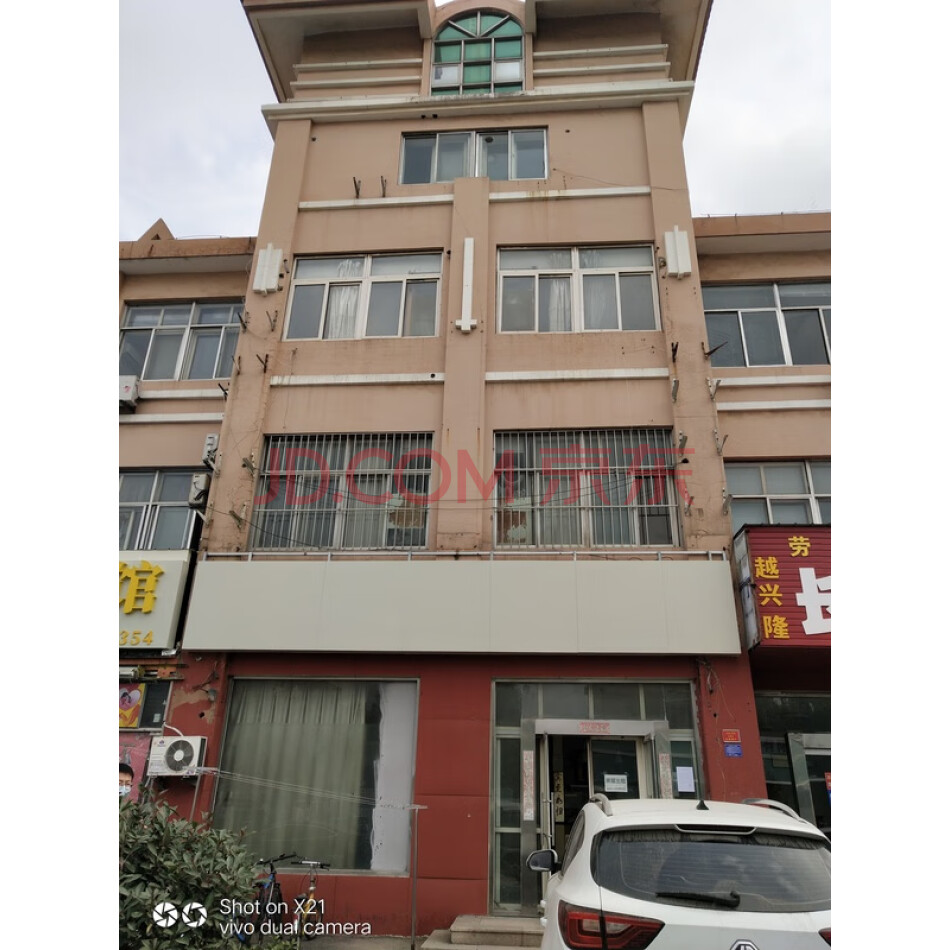 青岛市城阳区流亭街道仙家寨社区明远网点楼102号