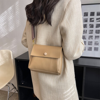 卡其色>dutrieux包包2023新款车缝线工艺简约百搭翻盖水桶包韩版宽