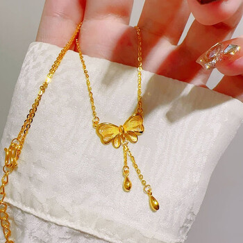 禧臣999足金蝴蝶结项链女新款黄金在逃公主流苏吊坠锁骨链送女友礼物
